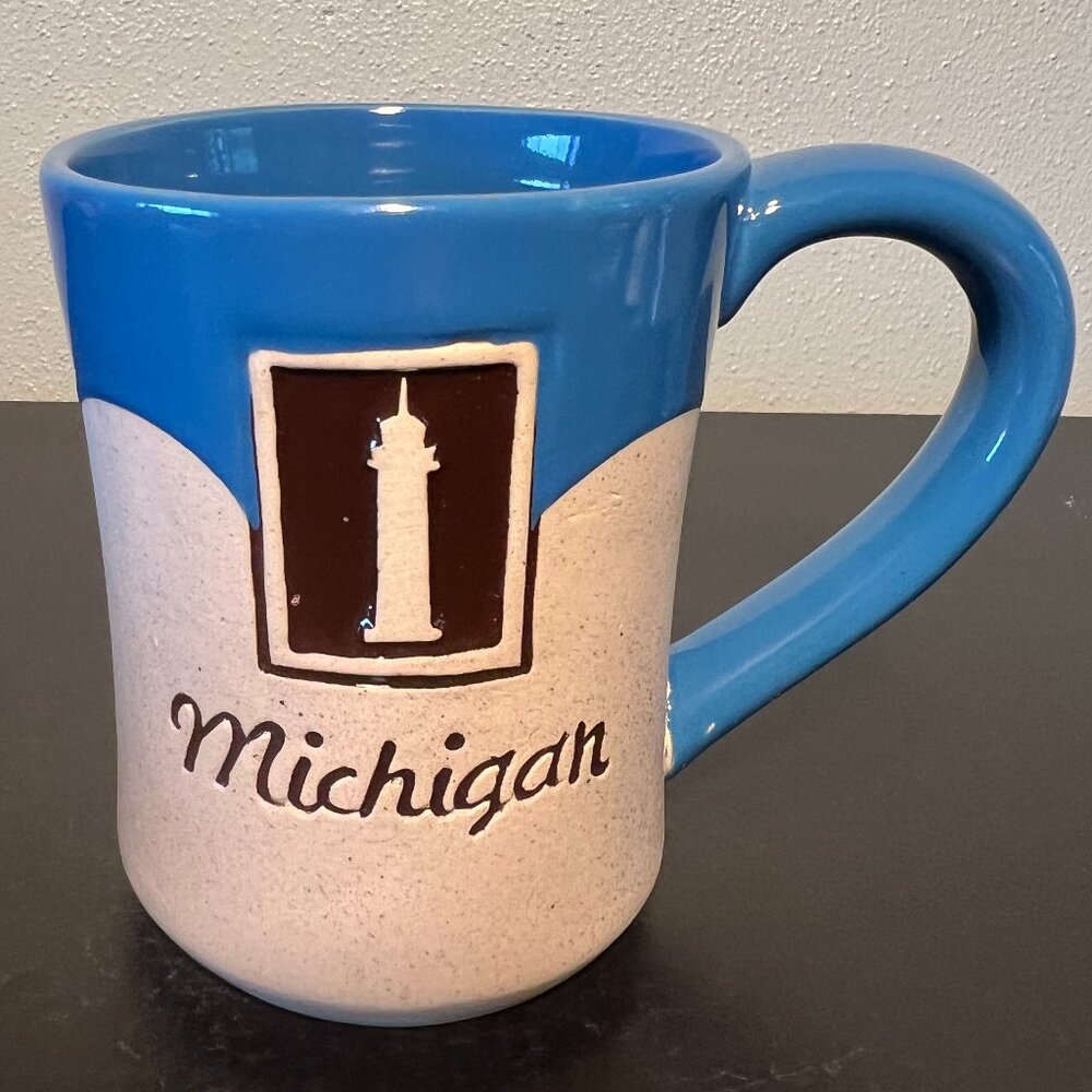 Michigan Lighthouse Embossed Souvenir Pottery Mug Unglazed & Glossy Blue Glaze
